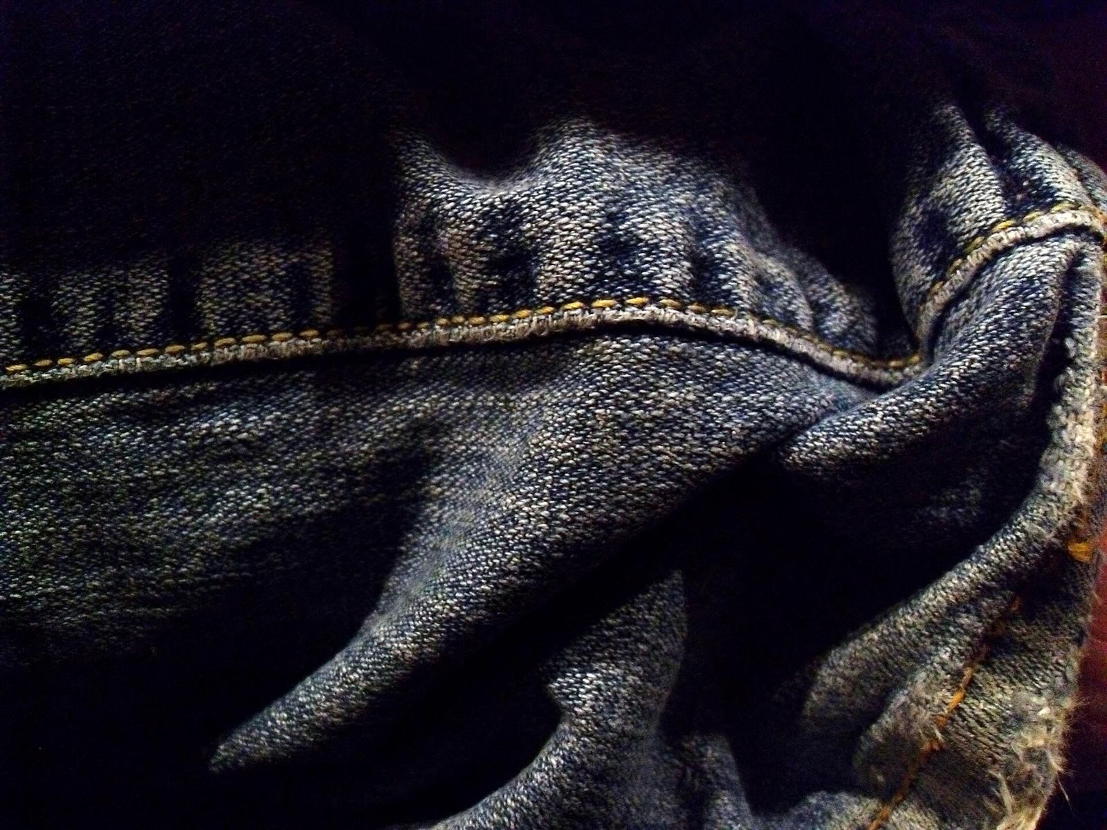 Close-up of dark denim fabric